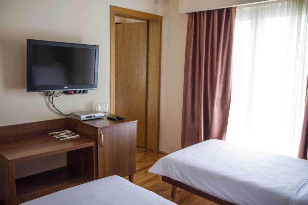 Hotel M Подгориця Номер фото