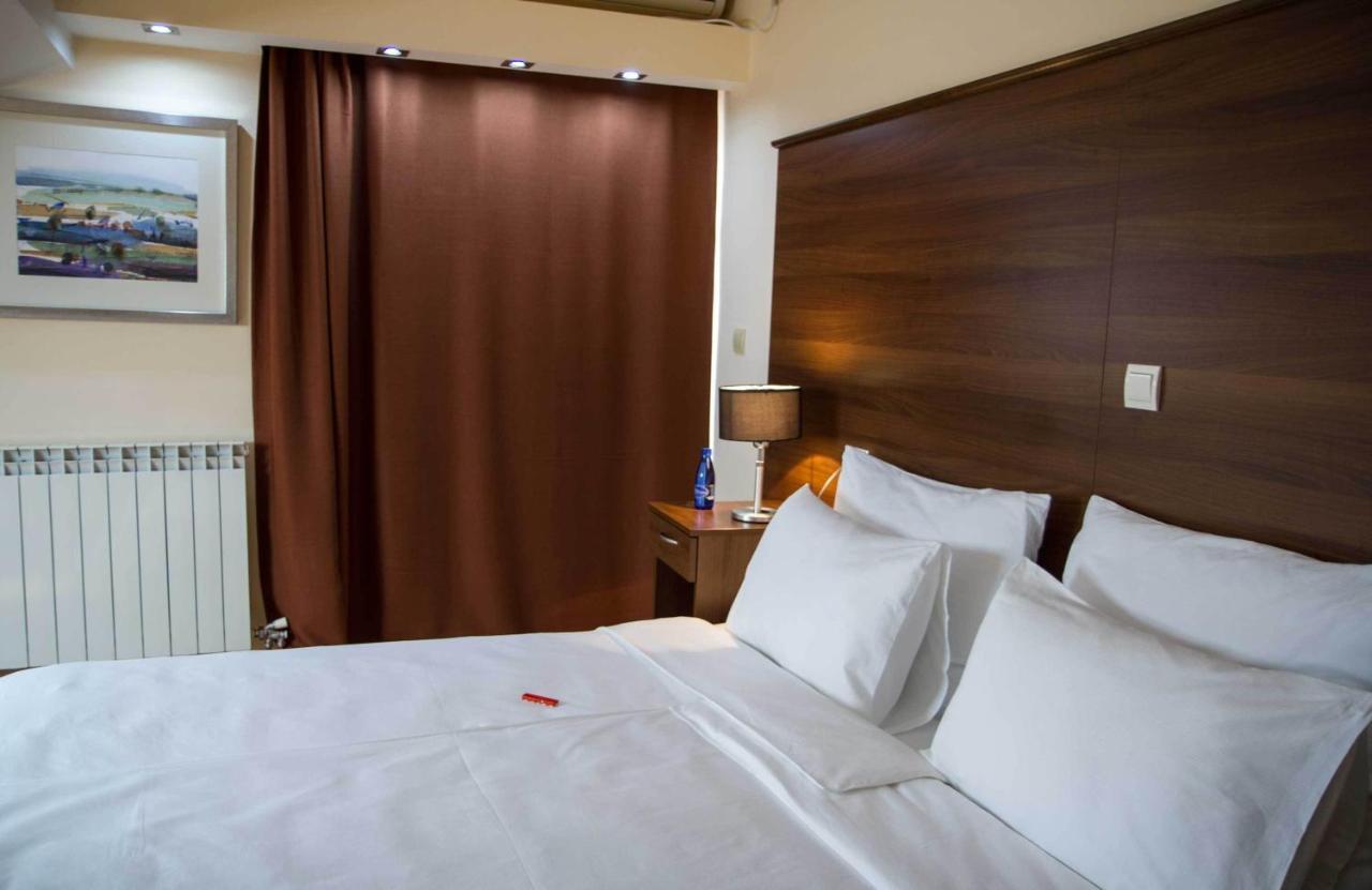 Hotel M Подгориця Номер фото